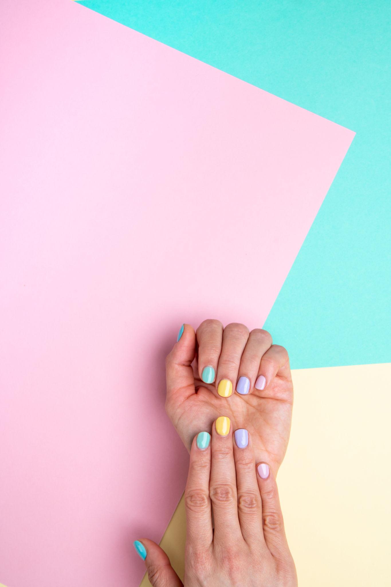 Nail technician applying polish during a calm salon appointment